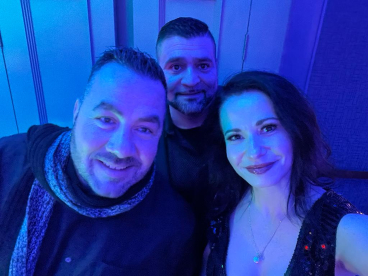 Three people taking picture